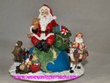 Santa on Globe Musical by Dillard's