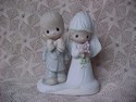Precious Moments - The Lord Bless You and Keep You Figurine